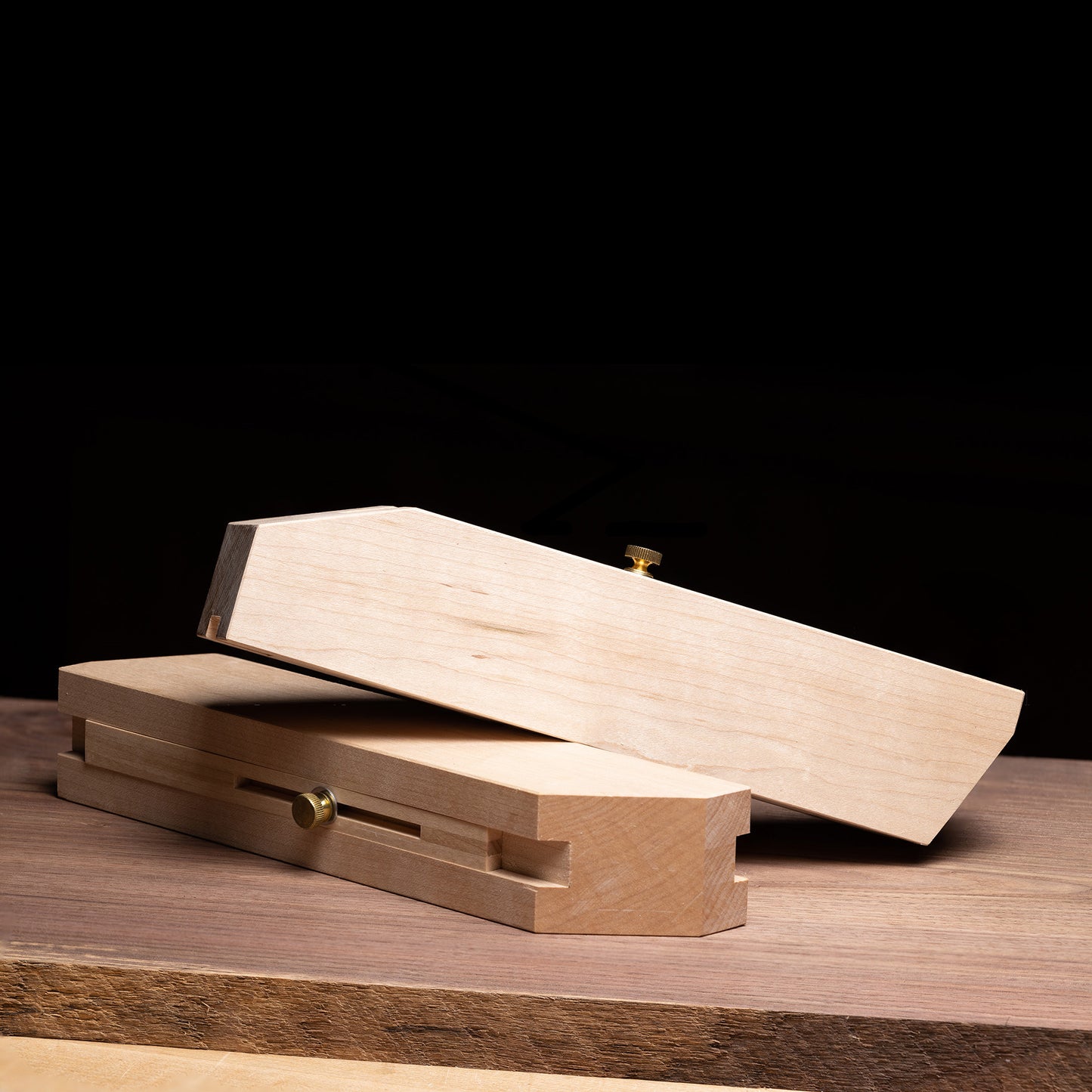 kumiko guide blocks on walnut slab