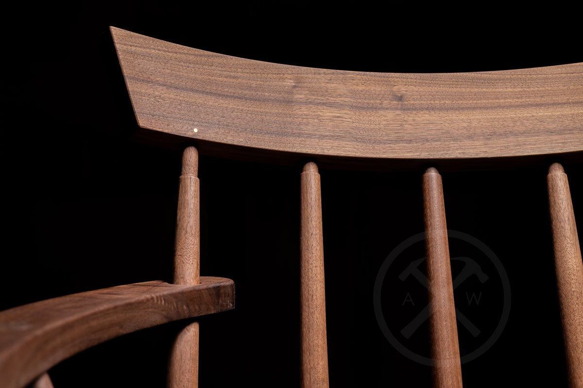 Irish American stick chair made from a walnut slab. Back and arm detail